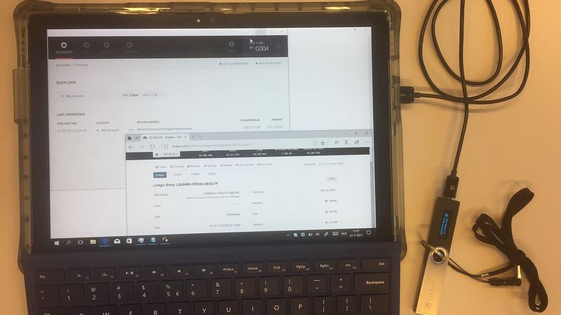 Hardware wallet connected to a tablet