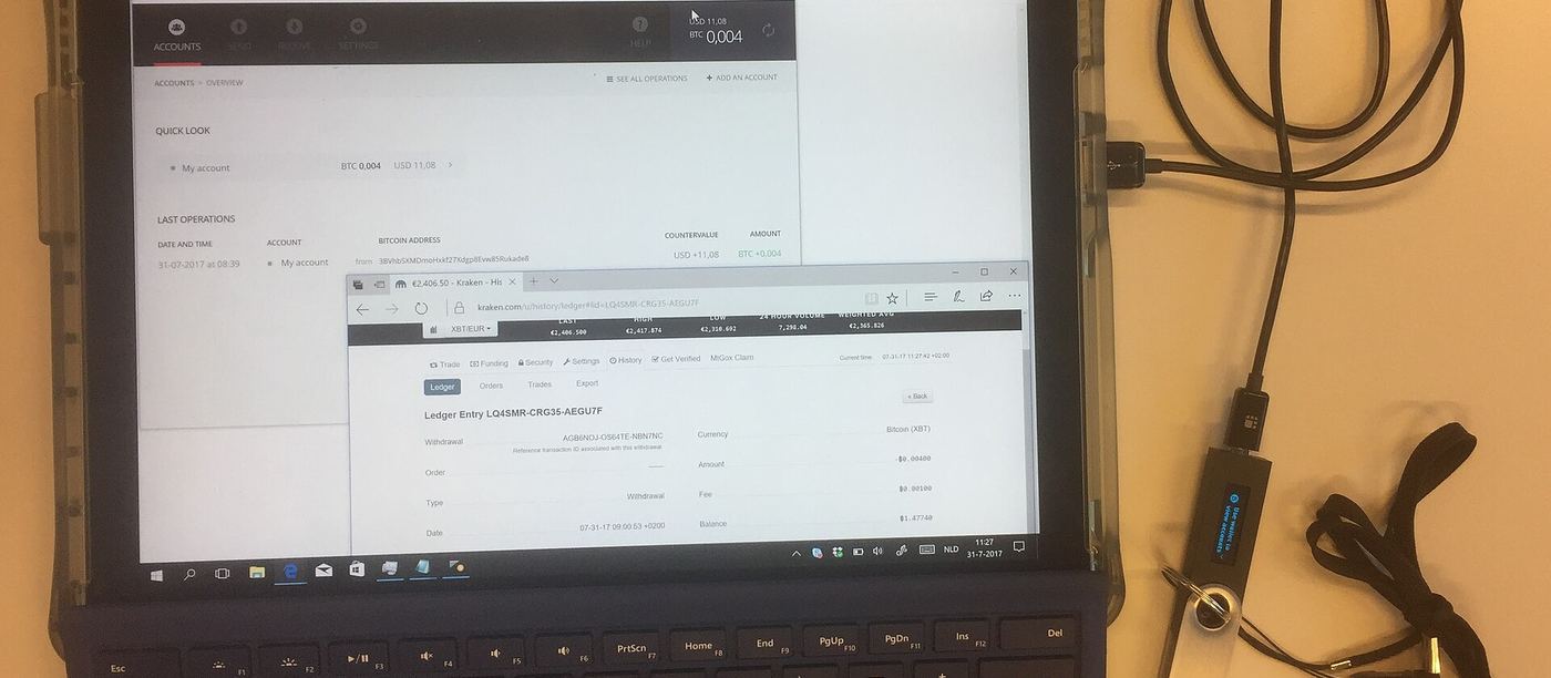 Hardware wallet connected to a tablet